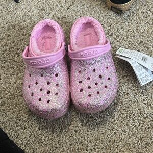 Brand new pink crocs